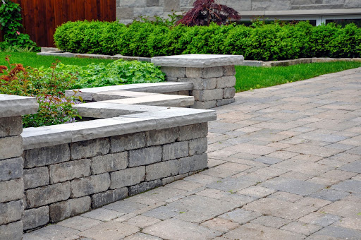 Do retaining walls require drainage systems?
