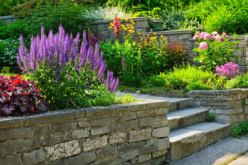 What materials are commonly used for retaining walls