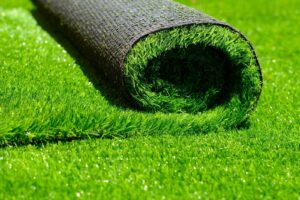 Artificial grass creates a beautiful easy-to-care-for landscape feature in outdoor areas